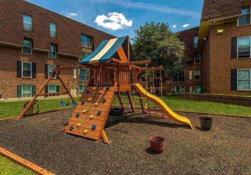 Playground with a yellow slide near 7400 Roosevelt apartments for rent in Northeast Philadelphia